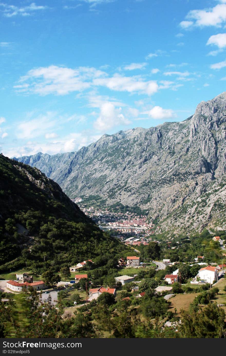 Village At Bottom Of Mountains