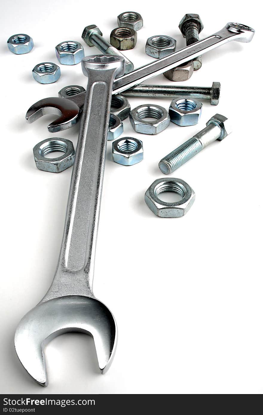 Chrome wrenches, nuts and bolts. Chrome wrenches, nuts and bolts