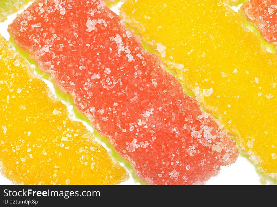 Fruit candy slices on the isolated white. Fruit candy slices on the isolated white