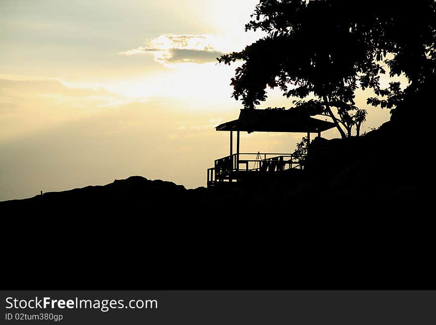 Silhouette hut by the sea