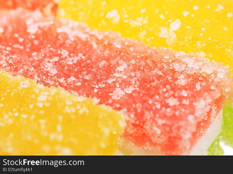 Fruit candy slices on the isolated white. Fruit candy slices on the isolated white