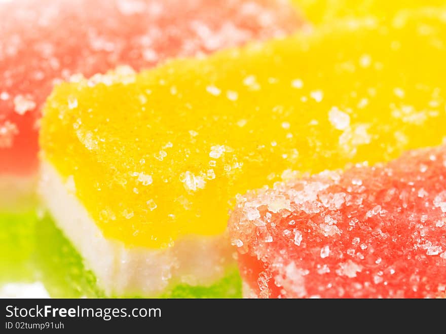 Fruit candy slices on the isolated white. Fruit candy slices on the isolated white