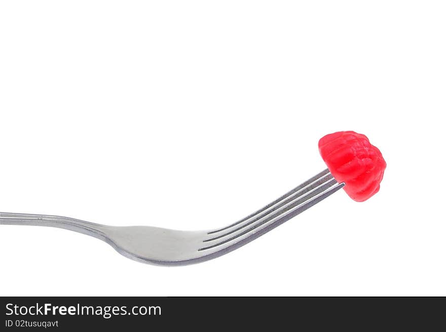 Jelly lolly on fork isolated over white