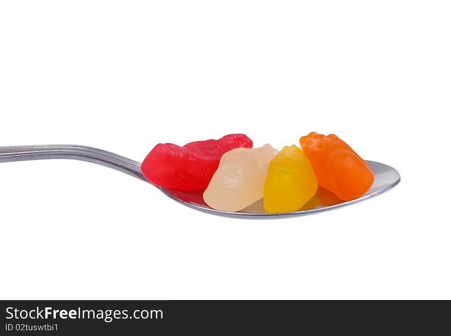 Jelly lolly on spoon isolated over white