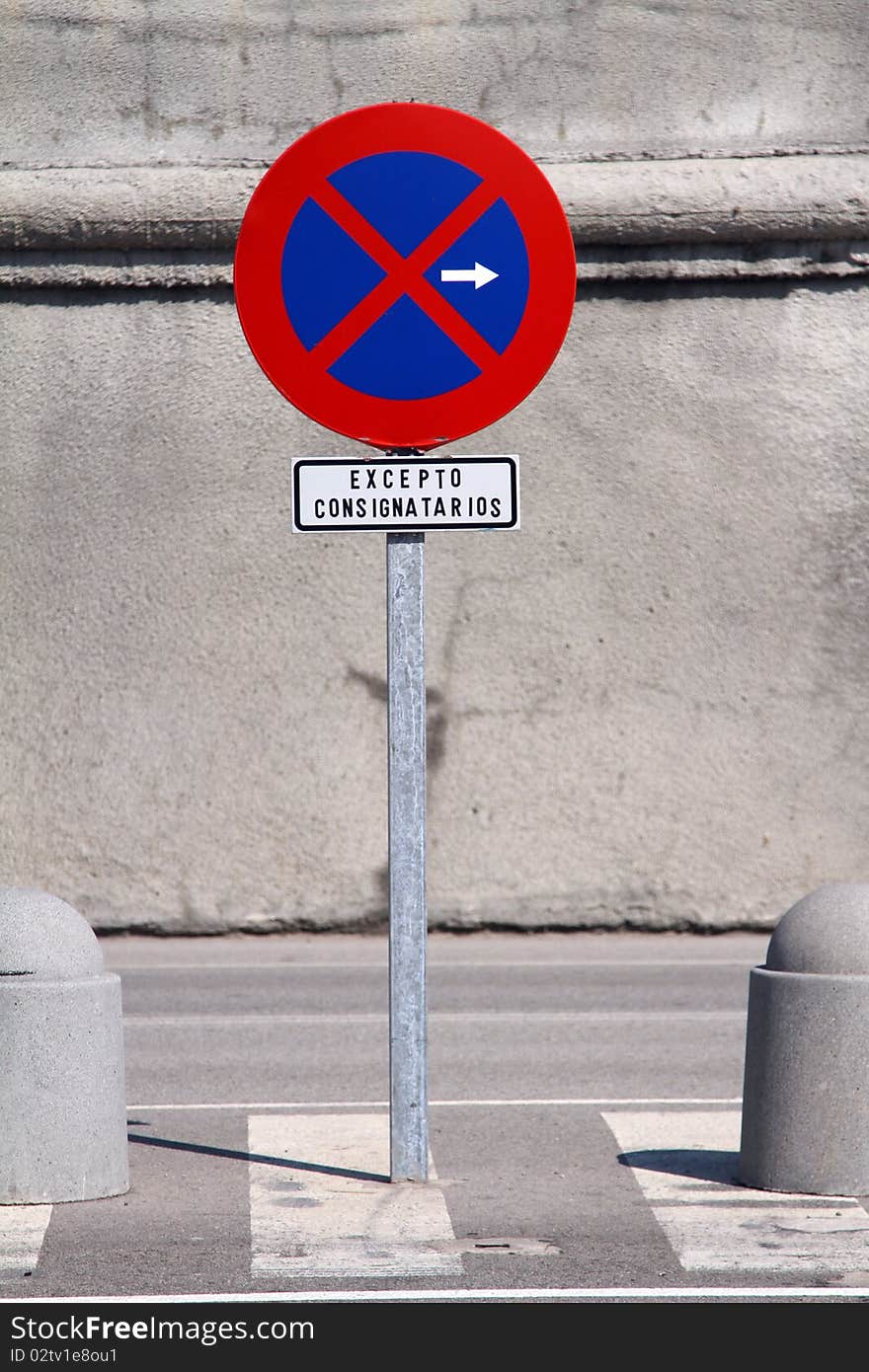 Road sign - no parking on the wall background