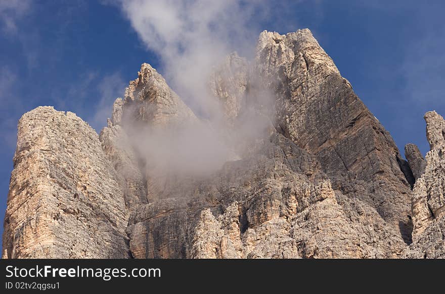 Tre Cime di Lavaredo against blue sky