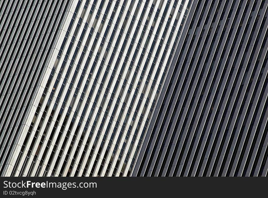 An abstract perspective on two skyscrapers forms a series of parallel diagonal lines. An abstract perspective on two skyscrapers forms a series of parallel diagonal lines