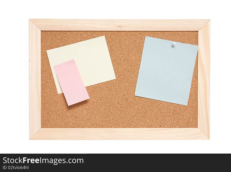 Corkboard With Empty Blue Pink And Yellow Notes