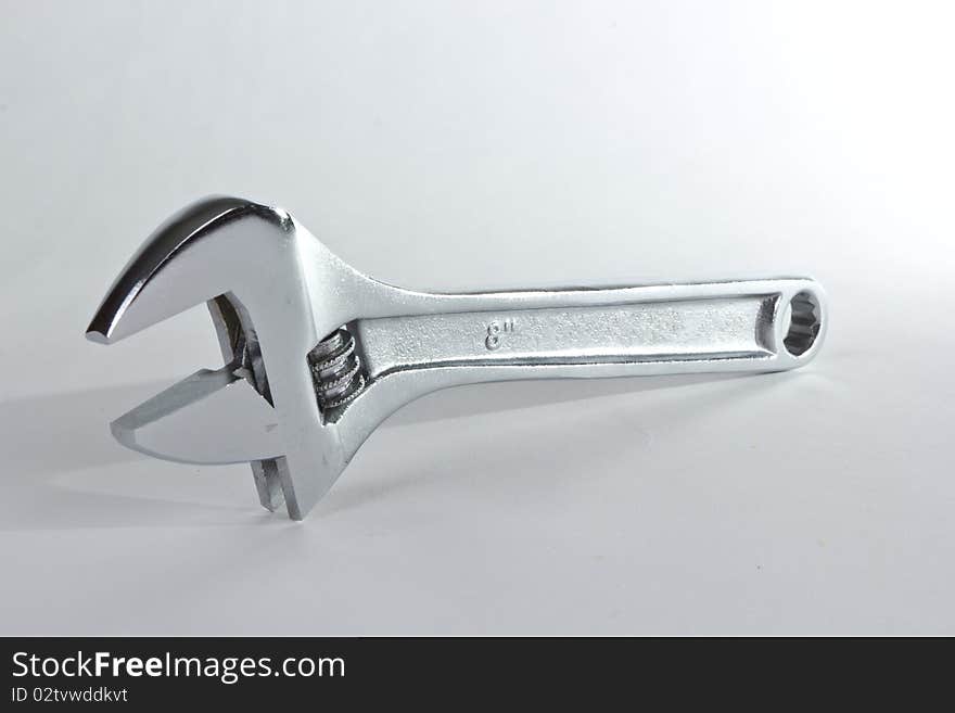 Mechanics adjustable chrome wrench isolated. Mechanics adjustable chrome wrench isolated