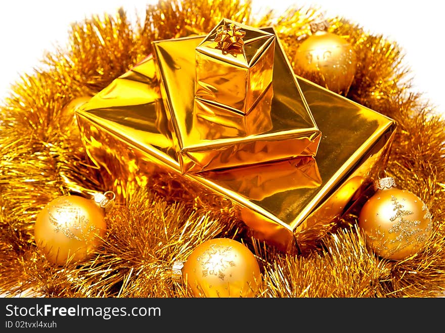 Yellow gifts boxes with christmas balls. Isolated on white. Yellow gifts boxes with christmas balls. Isolated on white