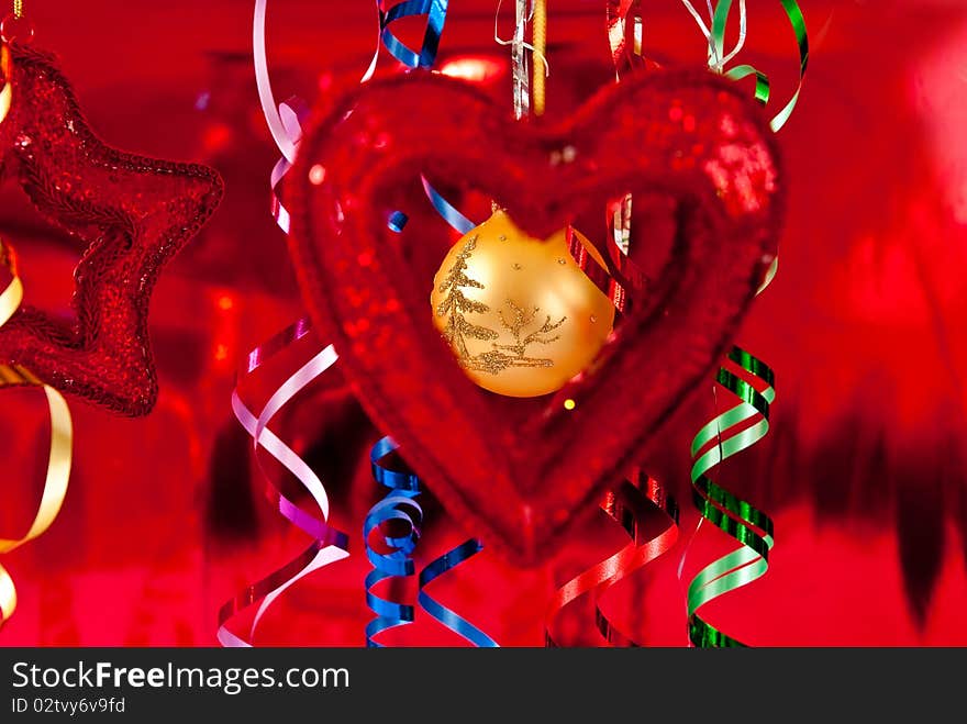 Christmas baubles and ribbons on red background. Christmas baubles and ribbons on red background