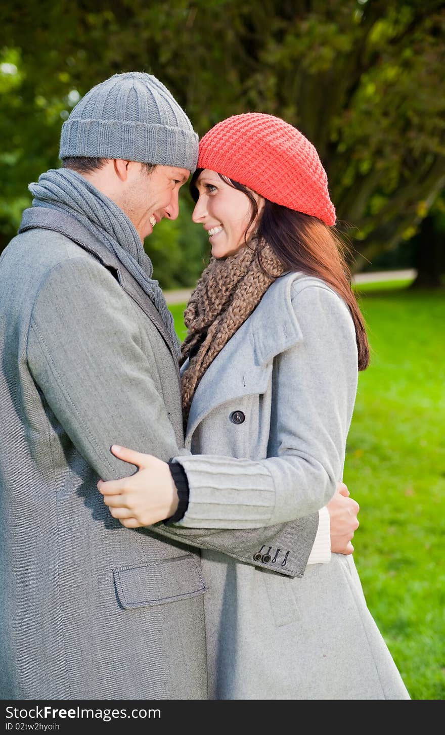 Laughing park couple portrait smiling. Laughing park couple portrait smiling