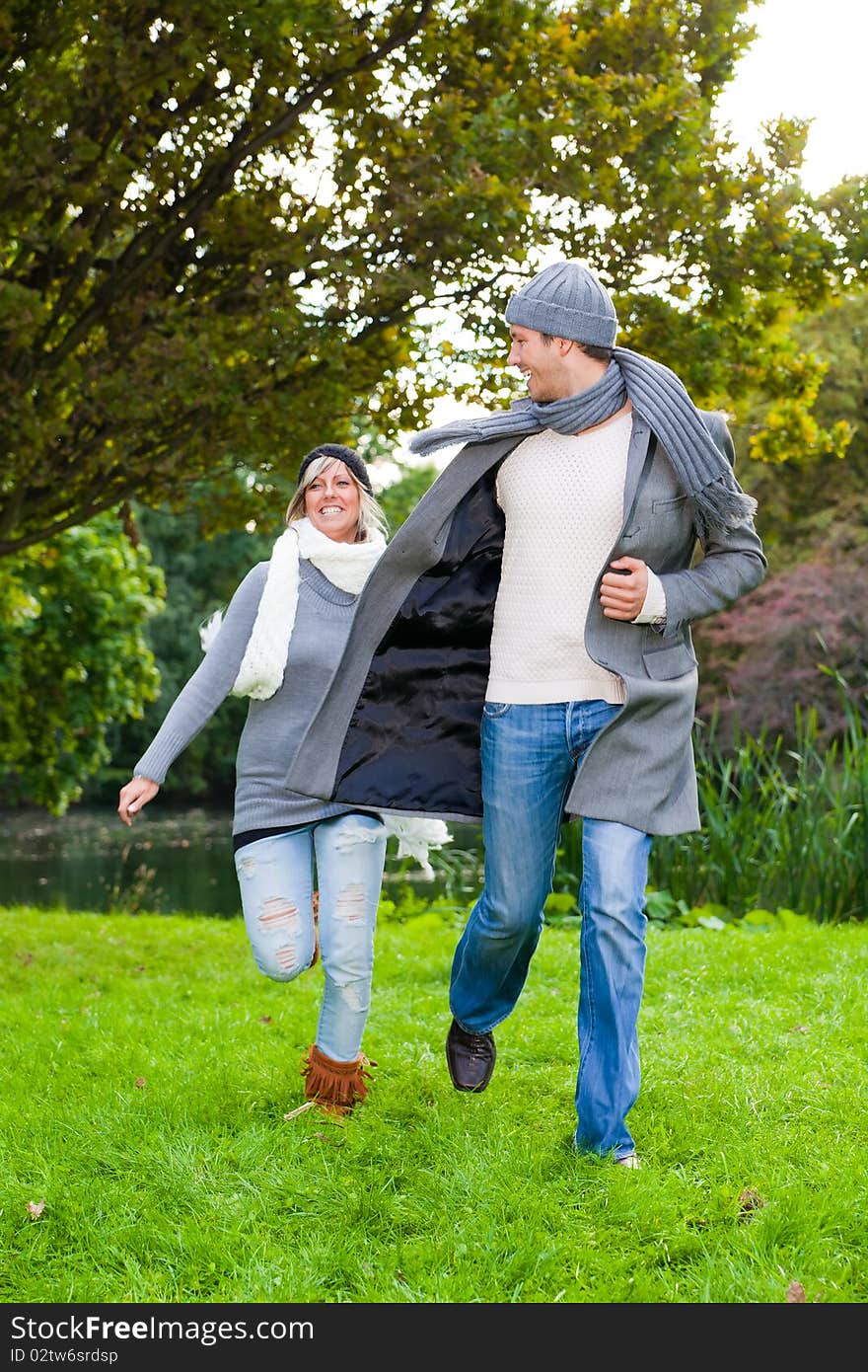 Happy hugging couple in garden park. Happy hugging couple in garden park