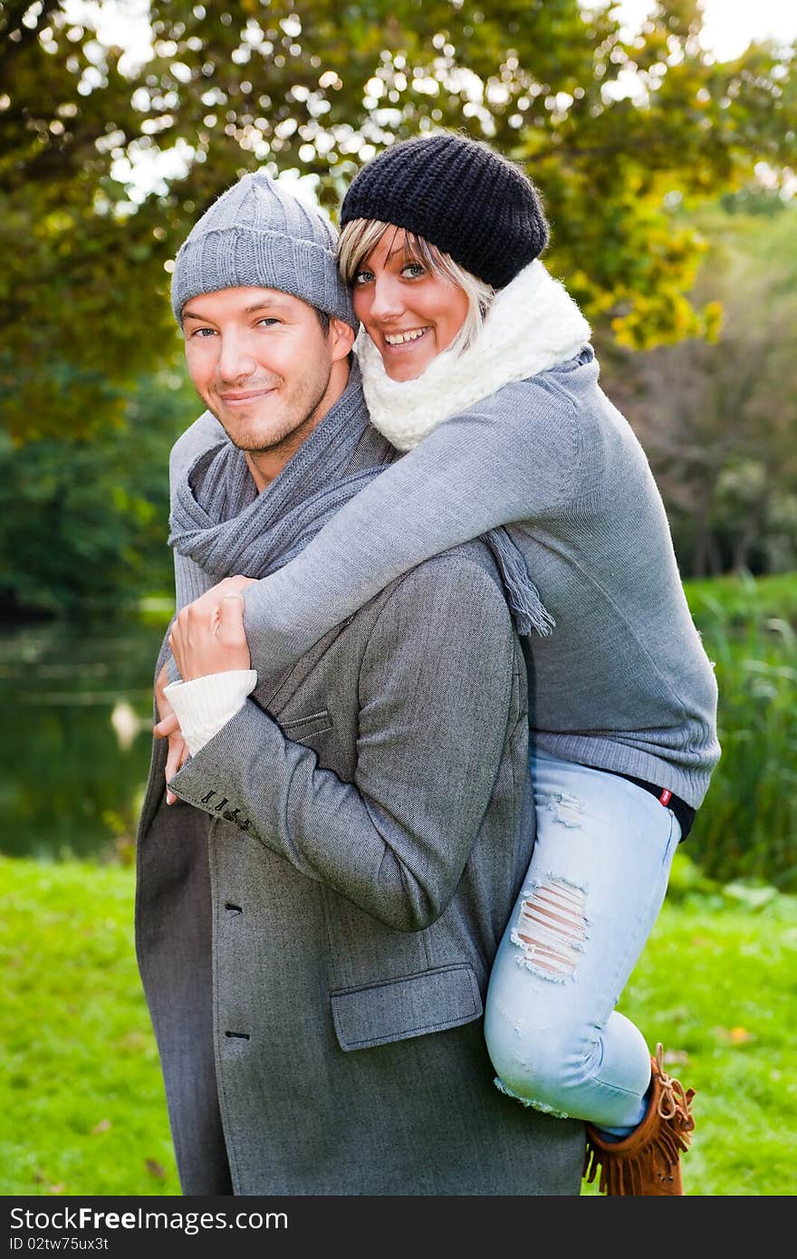 Happy hugging couple in garden park. Happy hugging couple in garden park