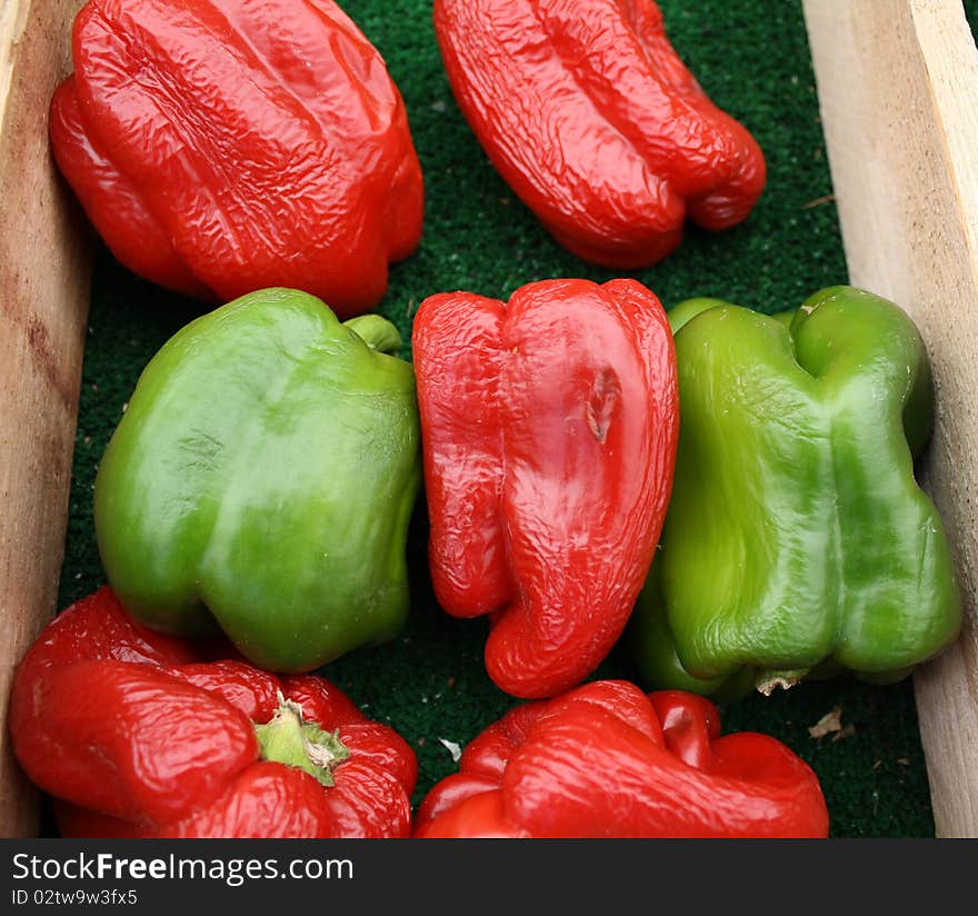 This is a shot of some red and green peppers on display for sale at our local Farmers Market. This is a shot of some red and green peppers on display for sale at our local Farmers Market.