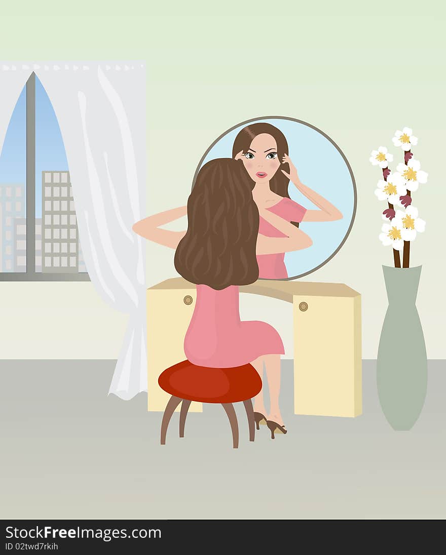 Girl doing make up at the mirror