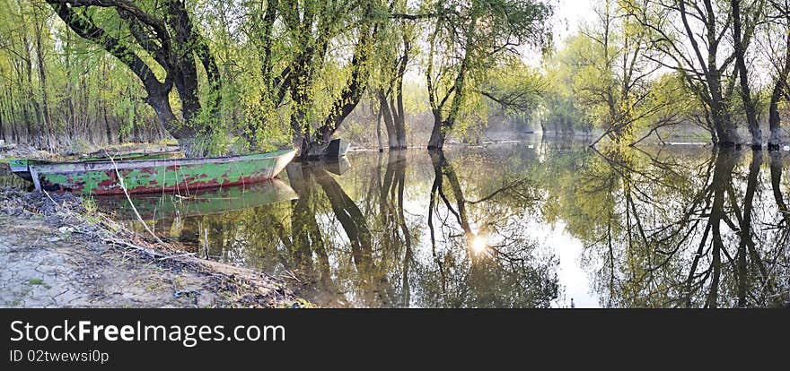 Boat and water reflexion  landscape on danube river