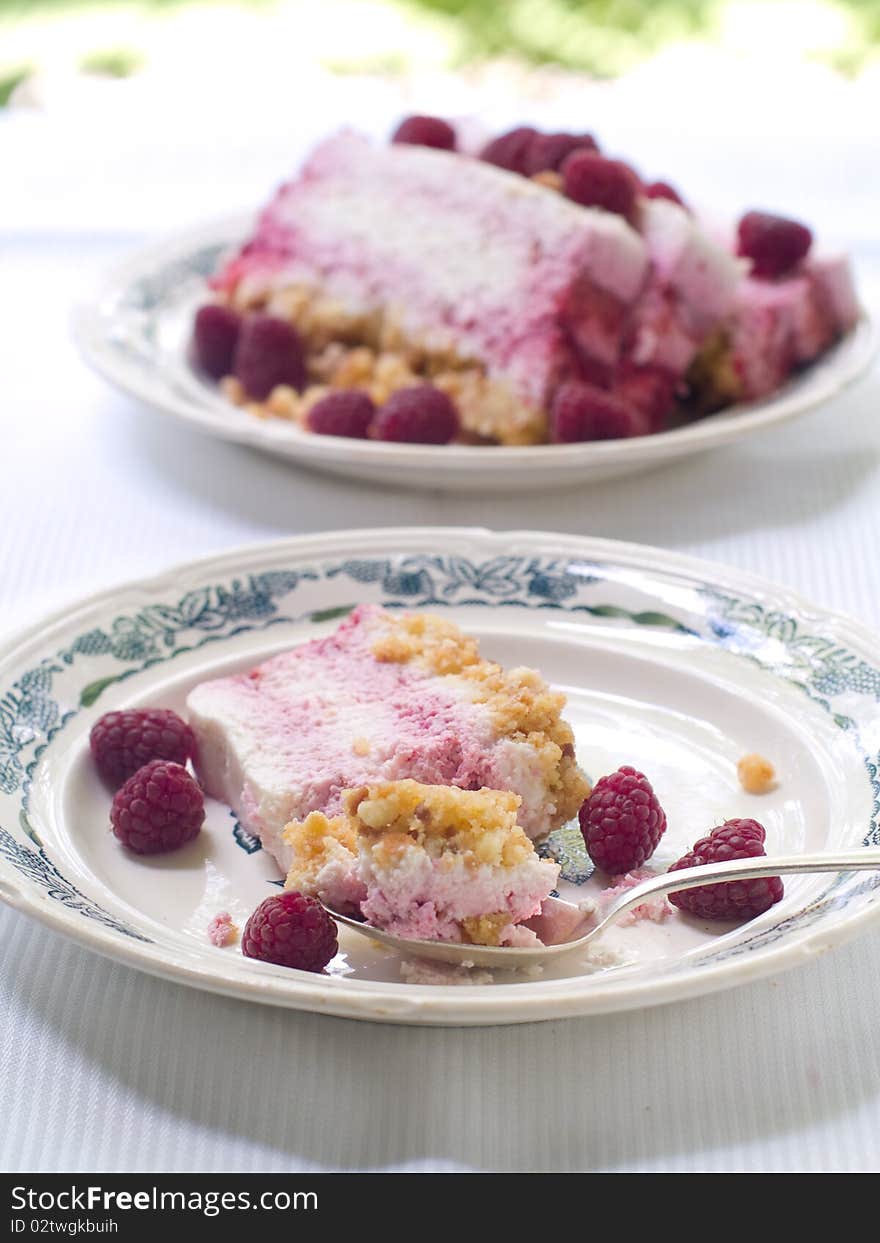 Cheesecake  with raspberry on plate