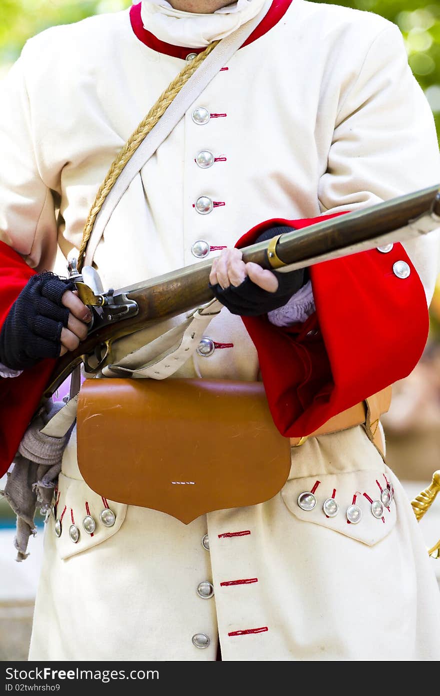 Soldier with carabiner and jacket during the re-enactment of the. Succession  War September 4, 2010 in Brihuega, Spain