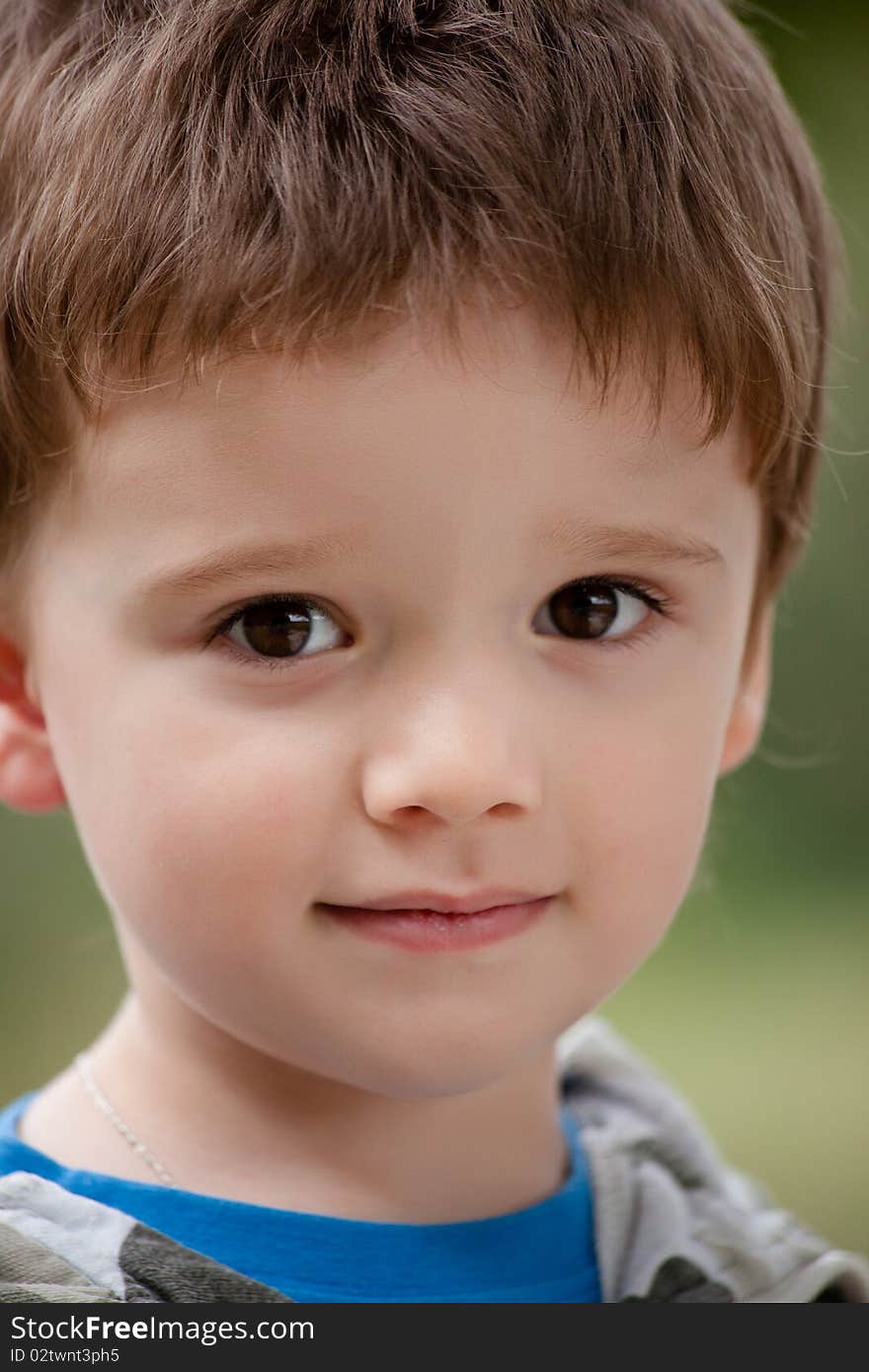 Portrait of cute boy in the nature. Portrait of cute boy in the nature