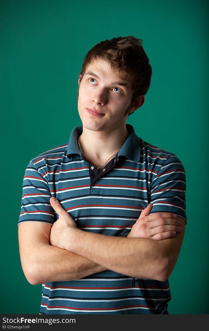 Young guy on a green background