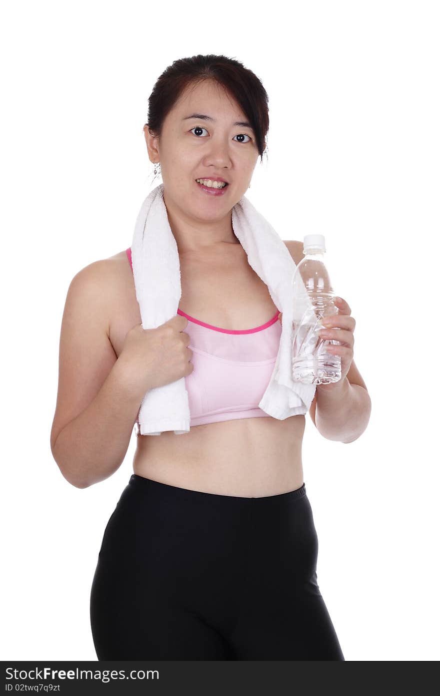 An Asian woman in fitness attire holding a bottle of water. An Asian woman in fitness attire holding a bottle of water