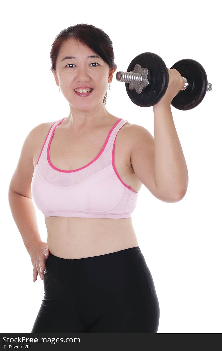 An Asian woman working out with a dumbbell. An Asian woman working out with a dumbbell