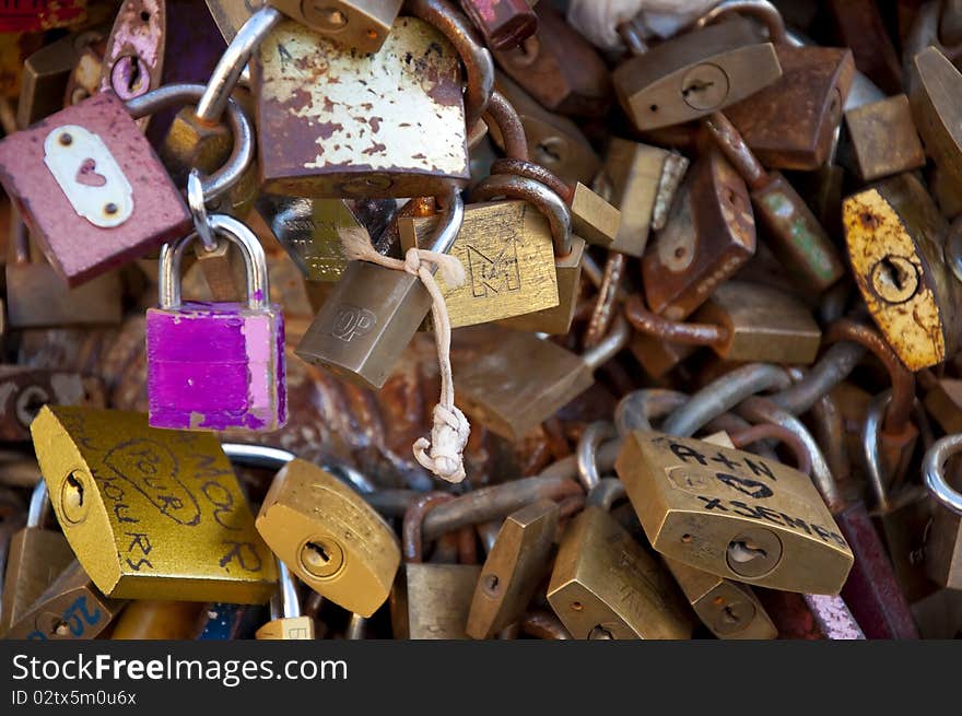 Locks on the bridge, tradition for italian people in love. Locks on the bridge, tradition for italian people in love
