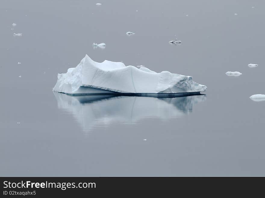 Icebergs in the famous icefjord beside the city of Ilulissat in Greenland. The icefjord is on UNESCO's World Heritage List. Icebergs in the famous icefjord beside the city of Ilulissat in Greenland. The icefjord is on UNESCO's World Heritage List.