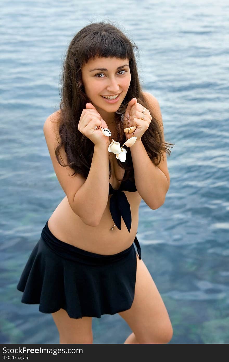 Young girl  near the sea