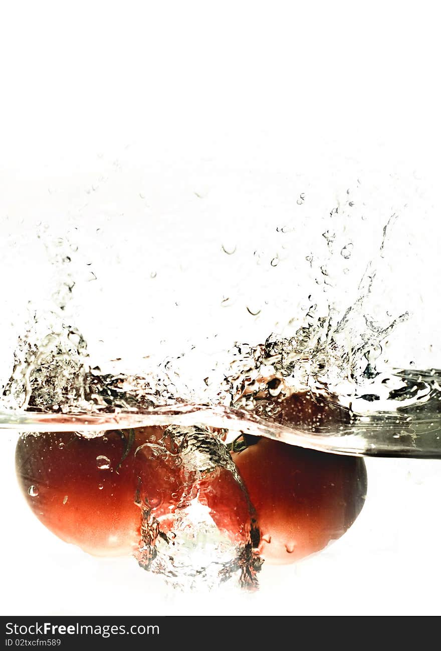 Tomatoes water splash