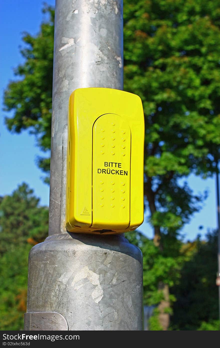 Push the Button on a Traffic light for Peoples