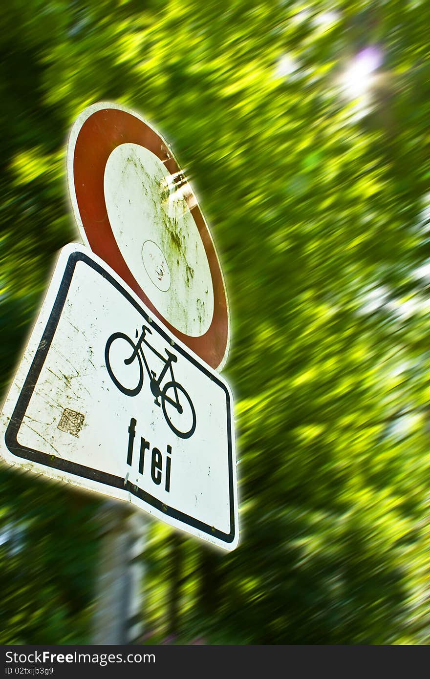 A Traffic Sign in a park for Bikers. A Traffic Sign in a park for Bikers