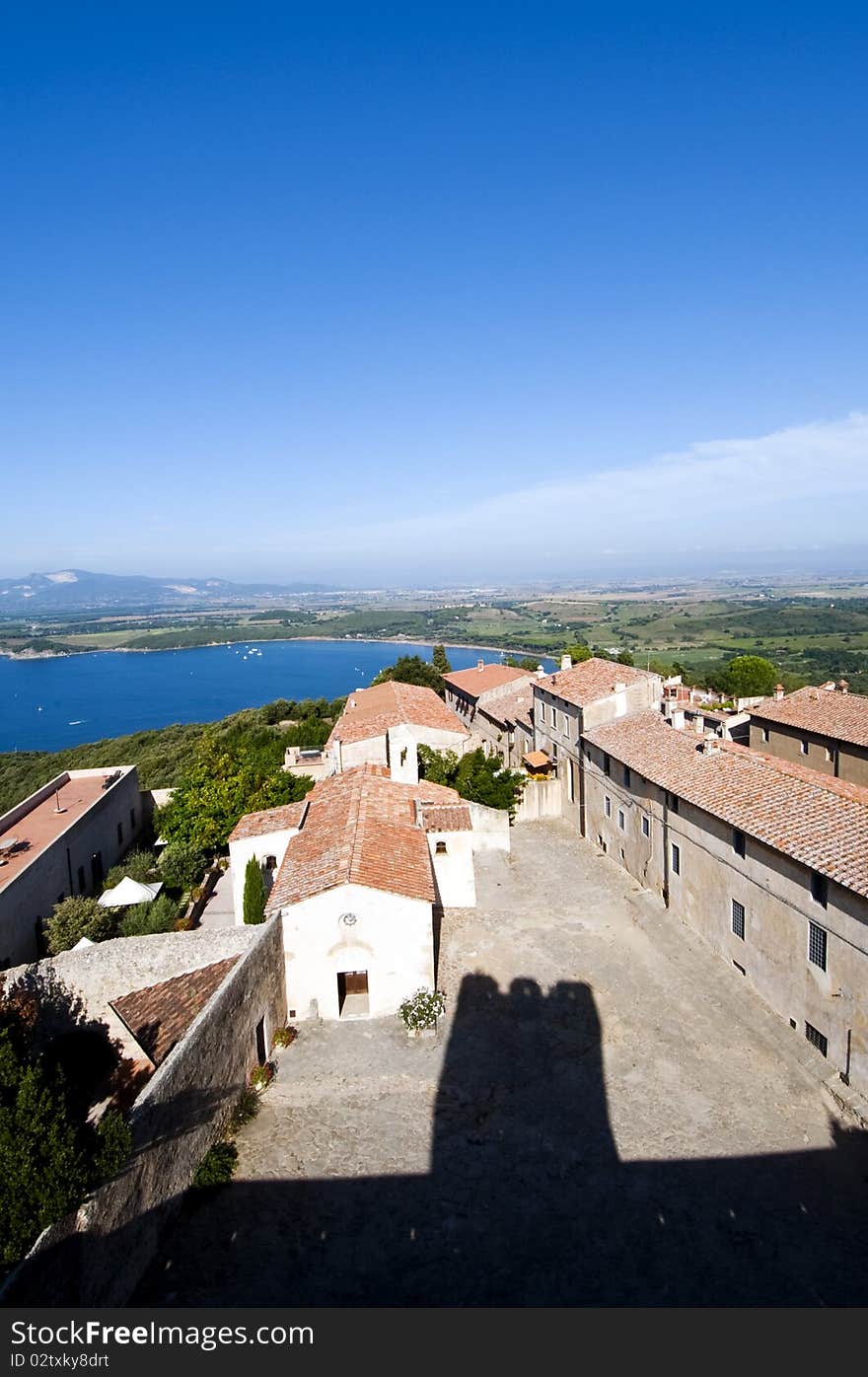 The ancient village of Populonia and the Gulf of Baratti. The ancient village of Populonia and the Gulf of Baratti