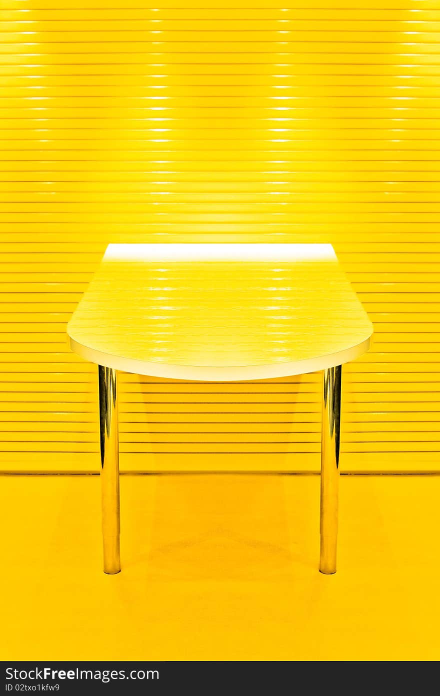 Abstract two legged table in lemon yellow. Abstract two legged table in lemon yellow