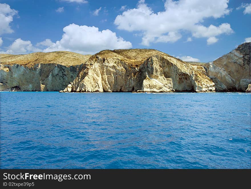 Rocky shore of a Greek island