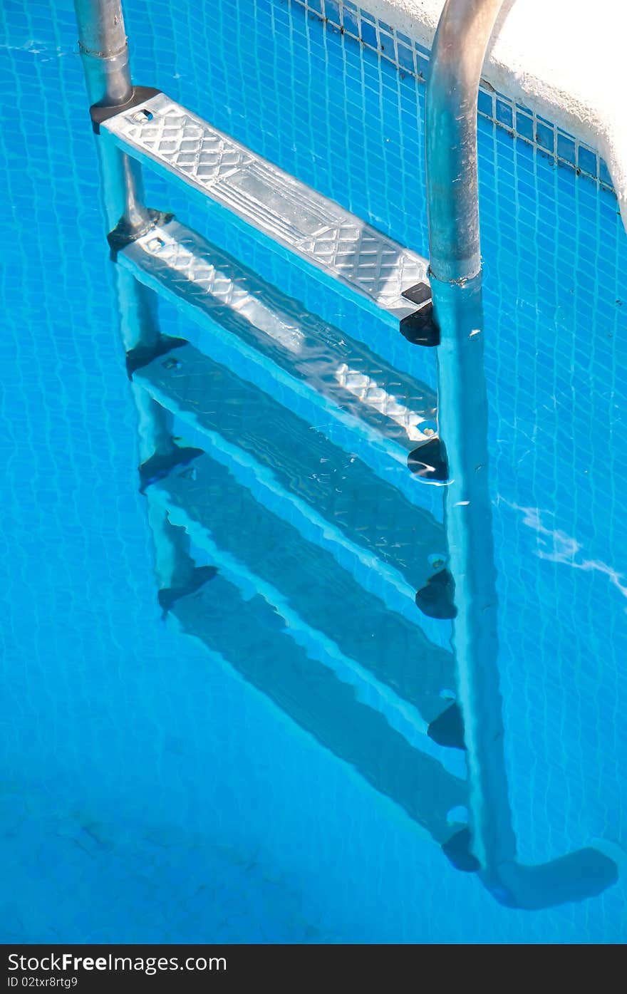 Pool ladder in a sunny day