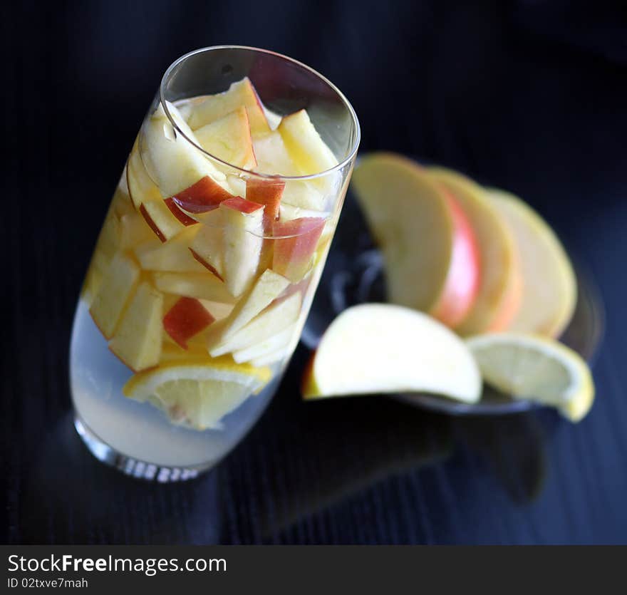 Apple and lemon drink in a glass