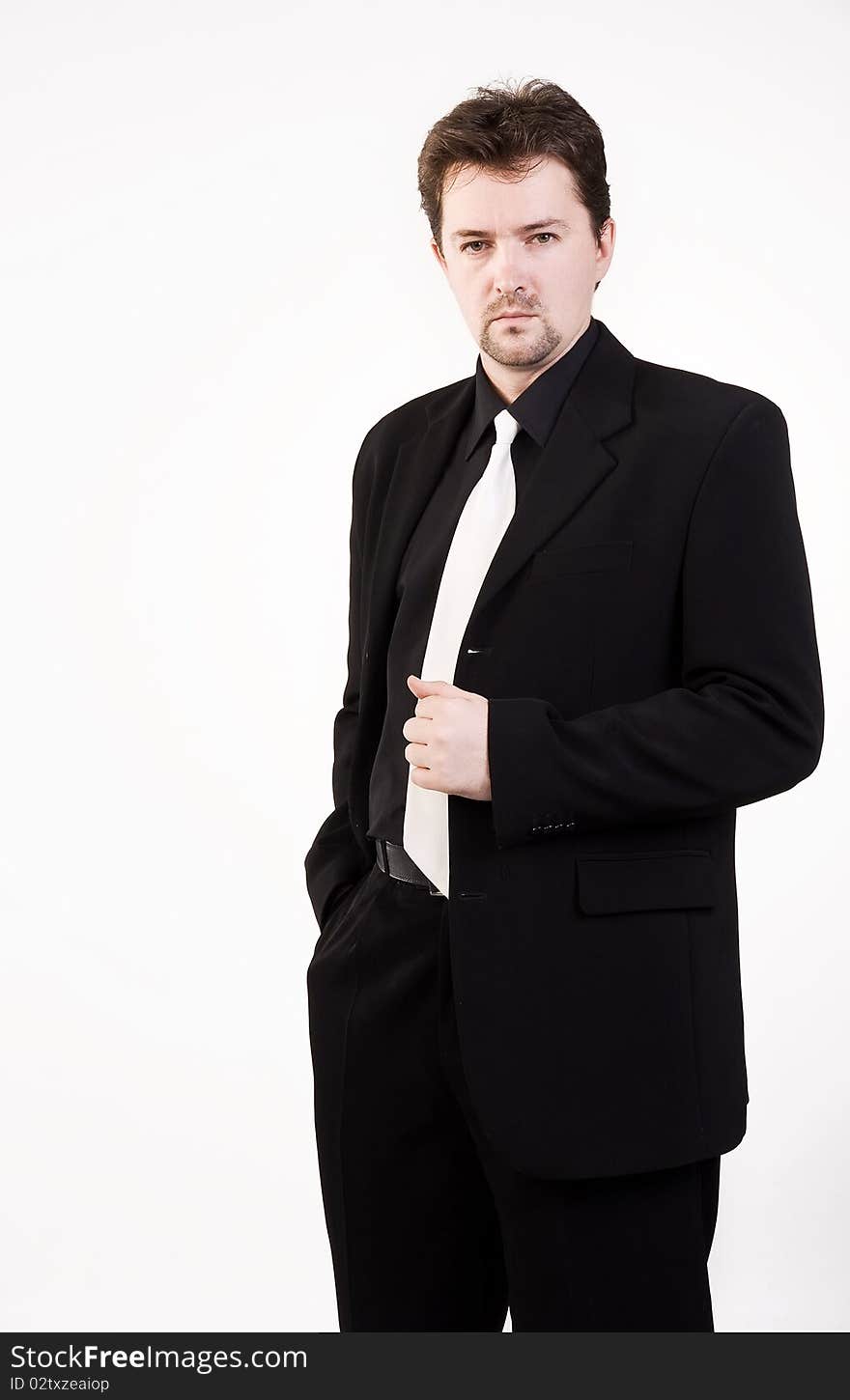 Portrait of the man in a black isolated over white background. Portrait of the man in a black isolated over white background