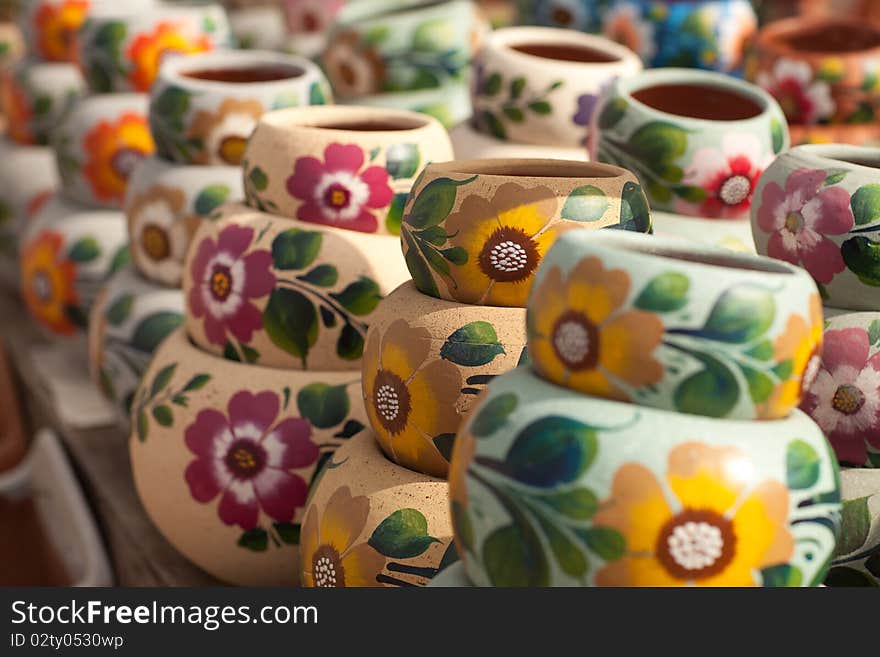 Variety of Colorfully Painted Ceramic Pots.