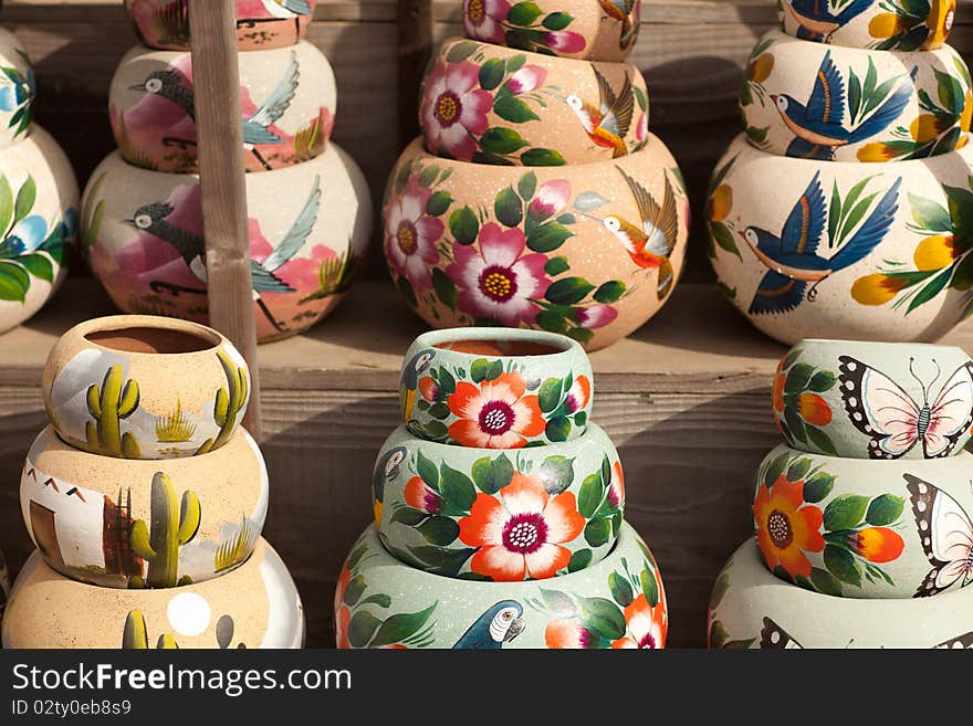 Variety of Colorfully Painted Ceramic Pots.