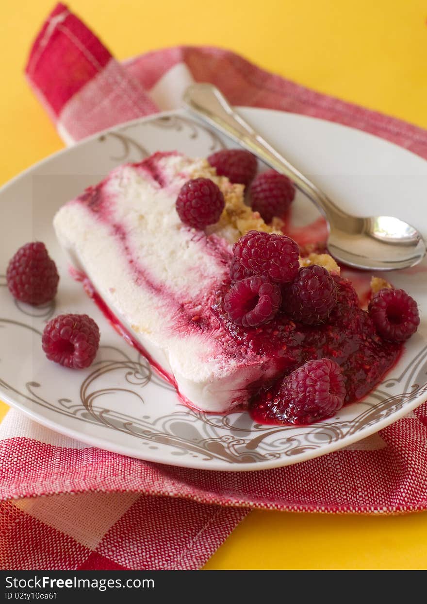 Cheesecake  with raspberry on plate