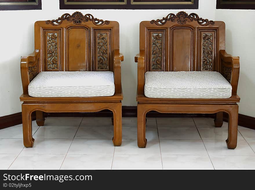 Wooden chairs carved with beautiful patterns.