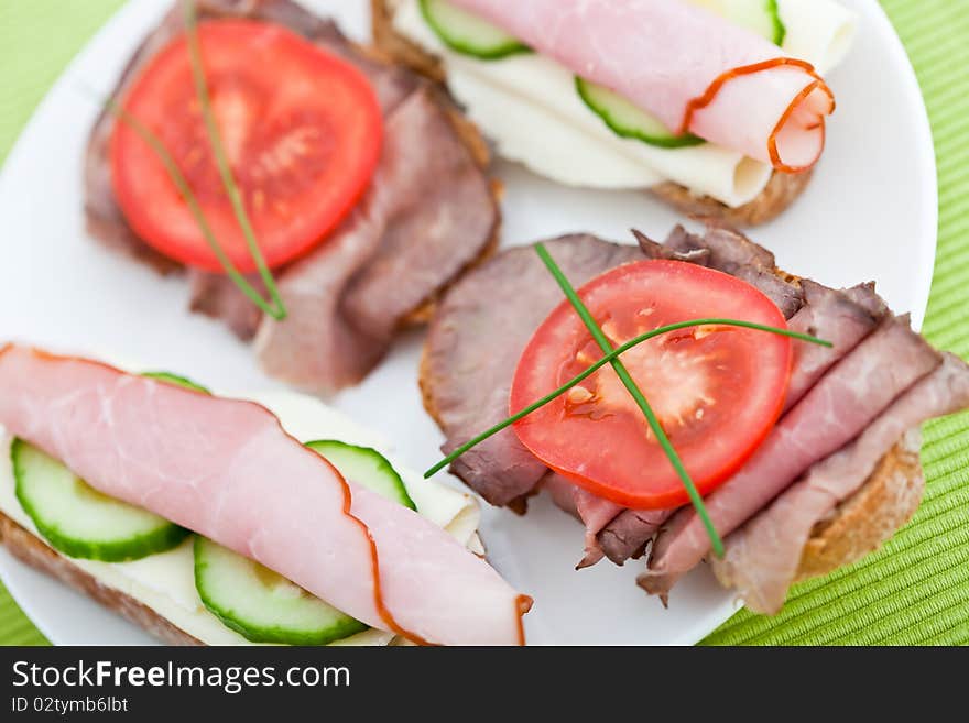 Appetizer Of Cheese, Ham, Beef And Cucumber