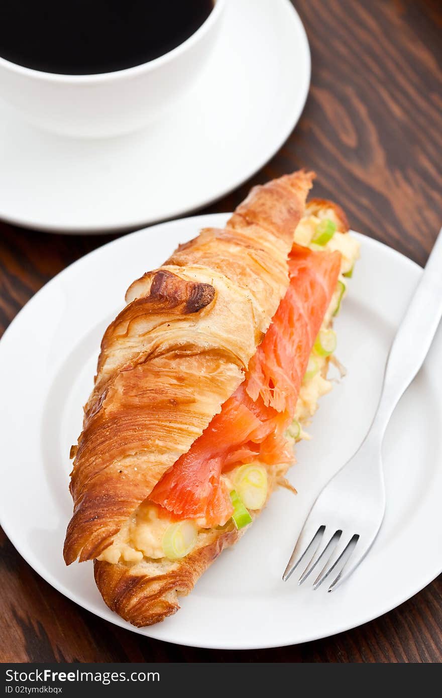 Croissant Filled With Smoked Salmon And Coffee