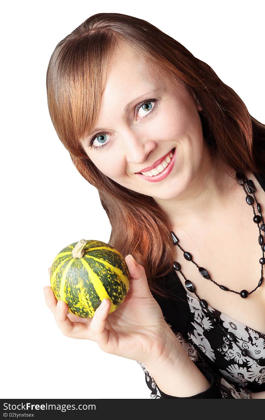 Happy, young woman holds the decorative pumpkin. Happy, young woman holds the decorative pumpkin