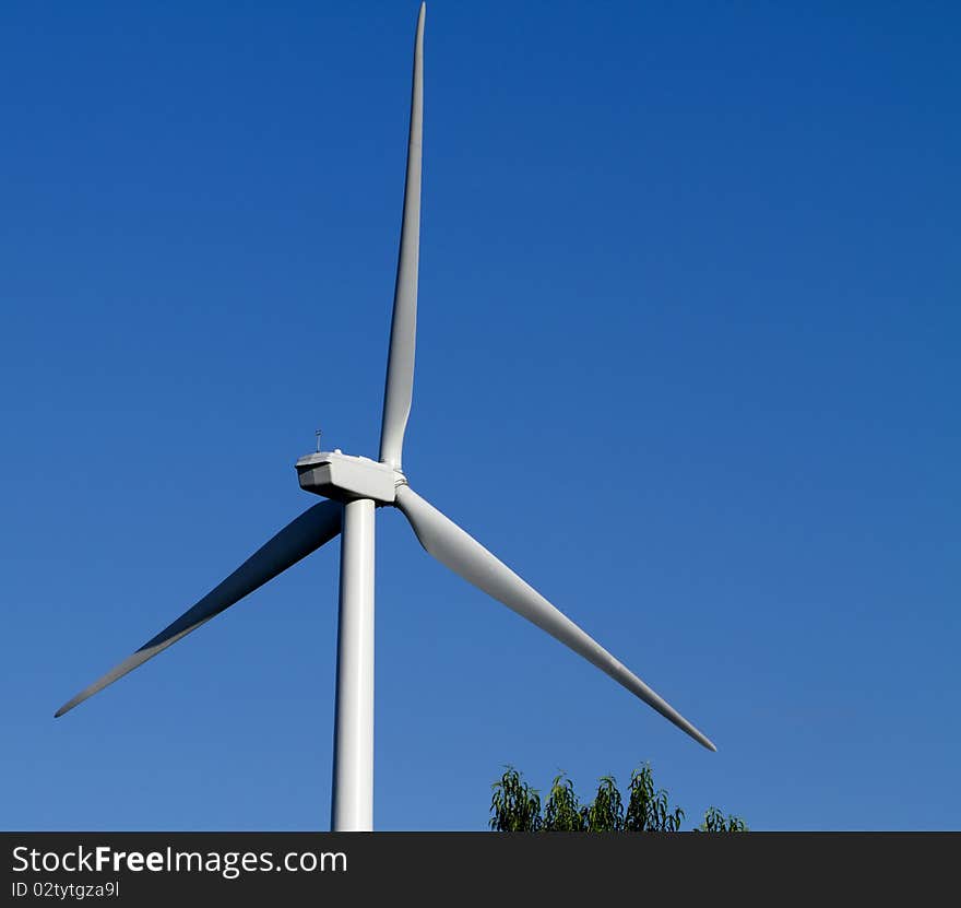 Windmill farm in the breezy hills of Iowa. Windmill farm in the breezy hills of Iowa