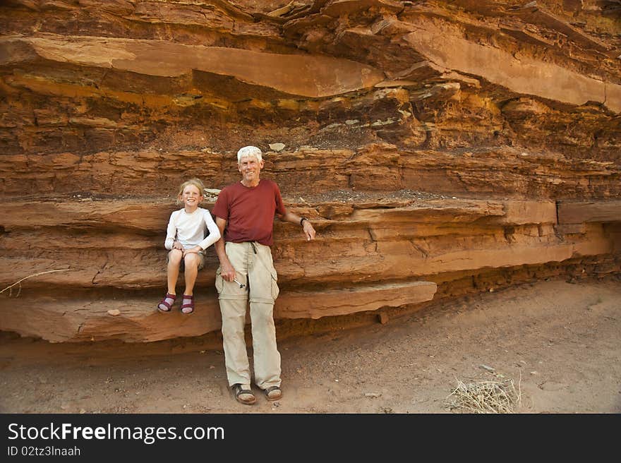 Father and daughter in the desert