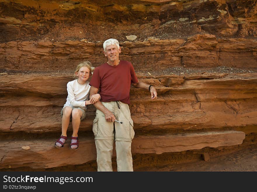 Father and daughter in the desert