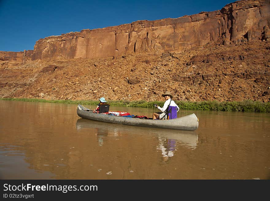 Mother And Daughter In A Canoe